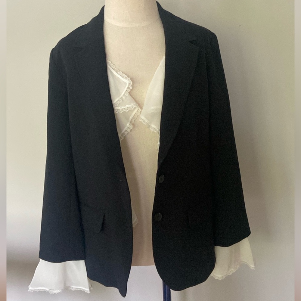 Black blazer by Anthropologie size 8. New with tags with removable lace details.
